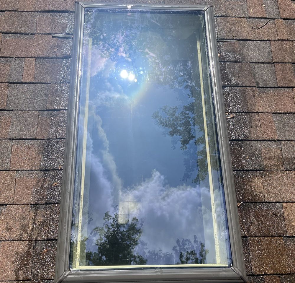 Skylight restored to crystal clear glass after cleaning