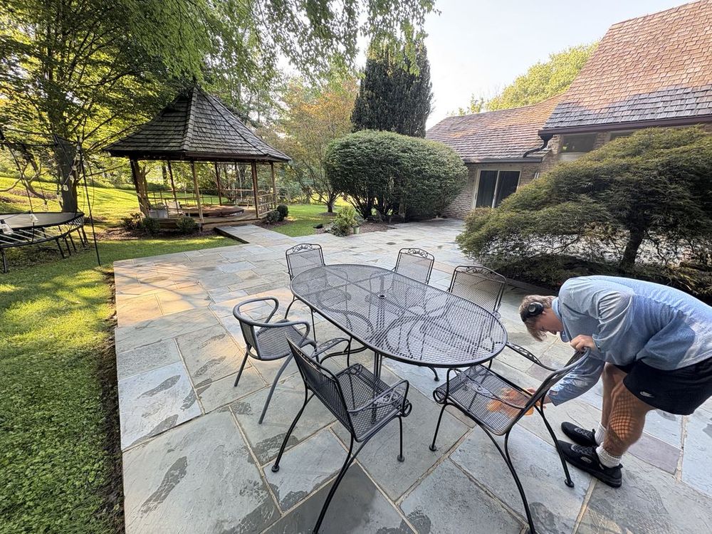 Bluestone patio after moss and grime washed off the natural stone