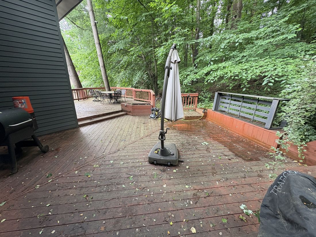 Wood deck before, weathered and dirty